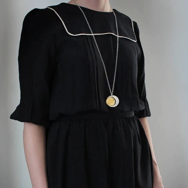 Large Crescent Moon And Spinning Gold Sun Necklace