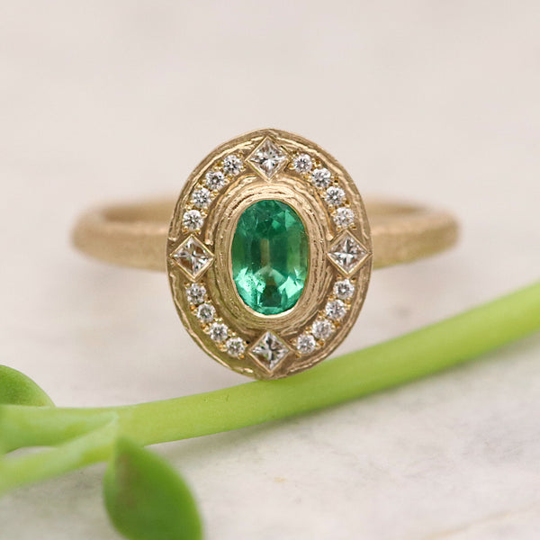 0.54ct Emerald And Diamond Textured Gold Halo Engagement Ring