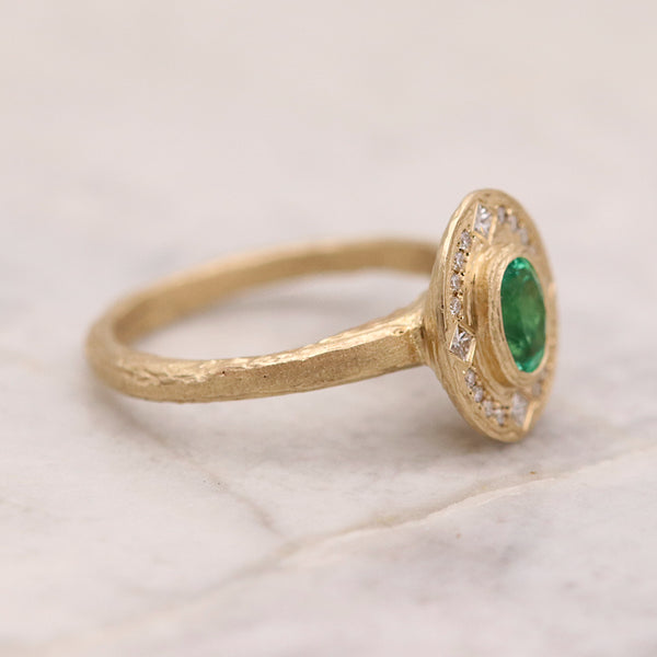 0.54ct Emerald And Diamond Textured Gold Halo Engagement Ring
