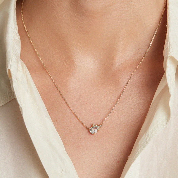 Aquamarine And Diamond Encrusted Pendant