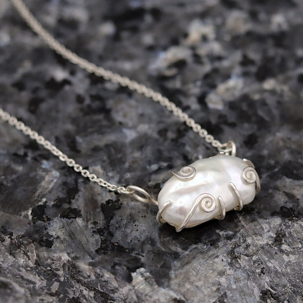 Keshi Pearl Pendant With Swirling Claws