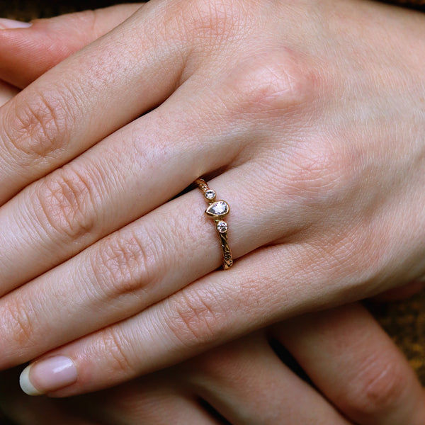 Intertwined Salt and Pepper Pear Diamond Trilogy Ring