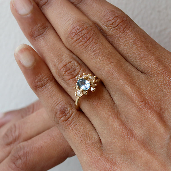 Pale Teal Sapphire and Diamond Sweeping Cluster Ring