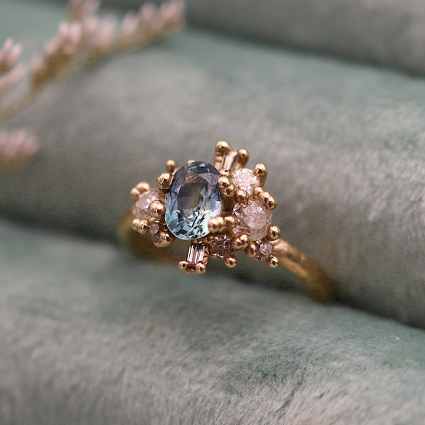 Pale Teal Sapphire and Diamond Sweeping Cluster Ring