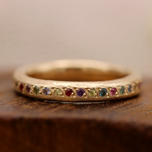 Sandcast Gold Rainbow Sapphires Eternity Ring