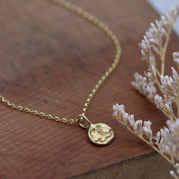 Tiny 18ct Gold Moth Pendant