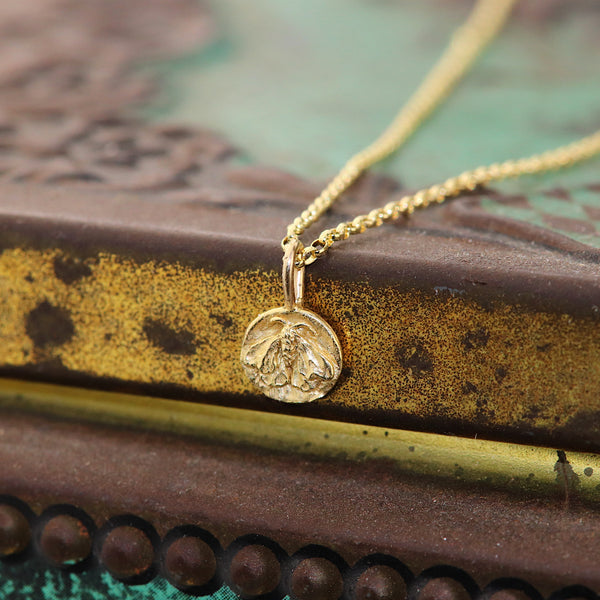 Tiny 18ct Gold Moth Pendant