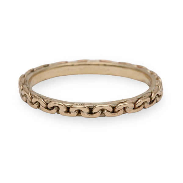 A gold chain-link band ring with a textured, interlocking link design, shown on a plain white background.