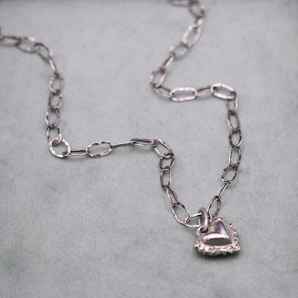 Frilly Silver Heart Pendant And Hammered Chain Necklace