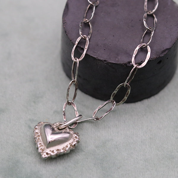 Frilly Silver Heart Pendant And Hammered Chain Necklace