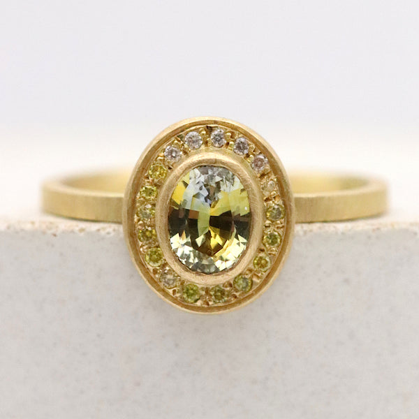 Yellow-White Sapphire And Diamond Halo Ring